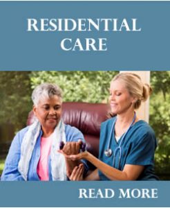 Residential Care or Caregiver assisting elderly woman